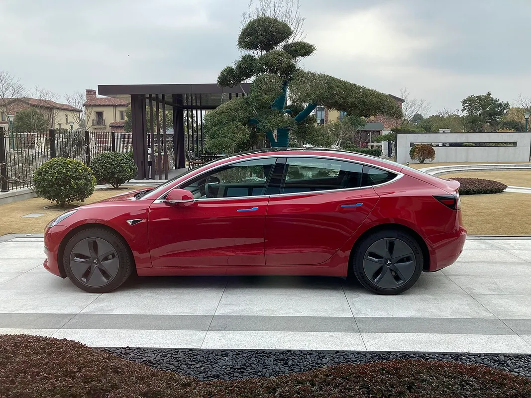 Tesla Model Y photographed from the passenger side
