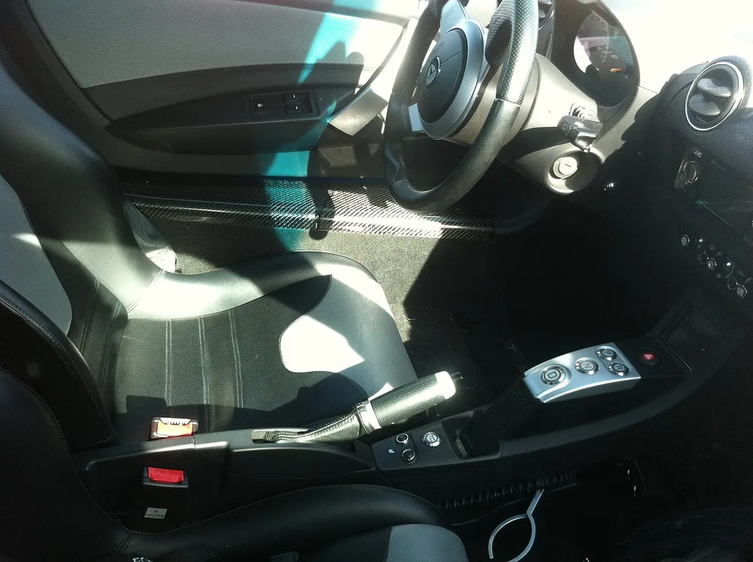 Interior of a Tesla Roadster, showing the dashboard and steering wheel